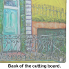 The House Next Door Glass Cutting Board