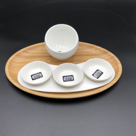 A mignardises (petit four) serving set with Bamboo oval tray and Porcelain dishes to match (Color: White)